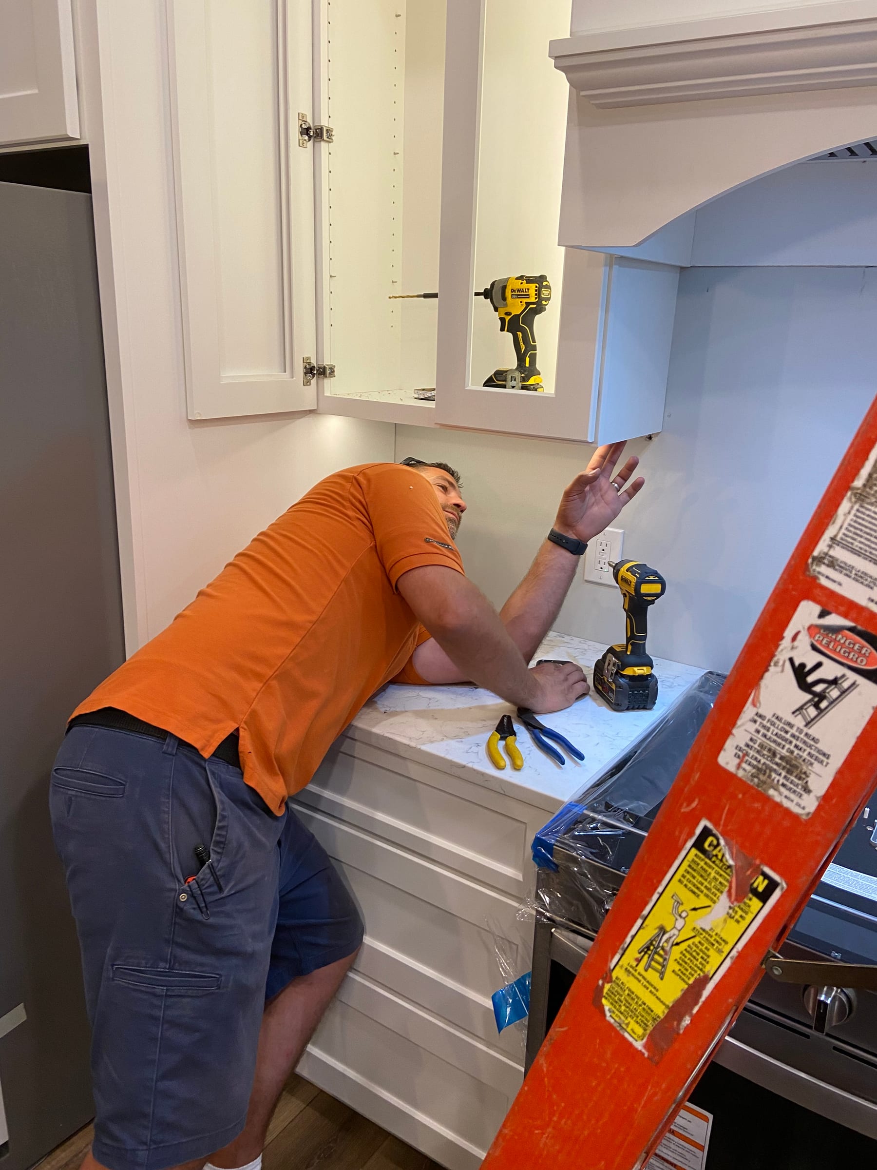 A Fine Line electrician wiring cabinet lighting